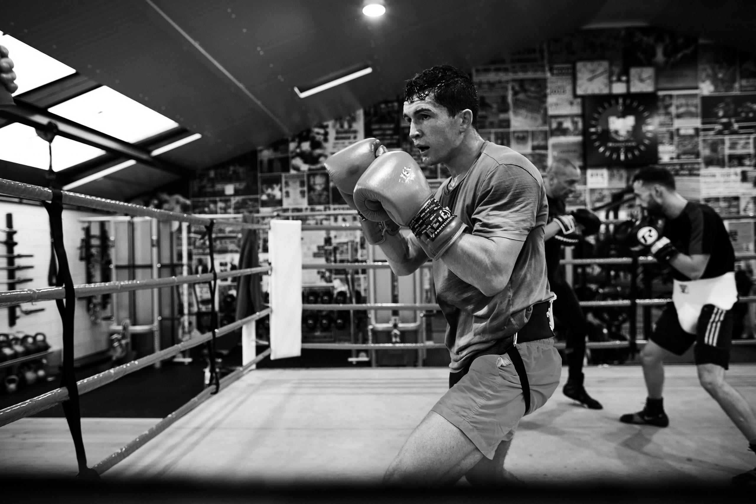 Louie Lynn wearing boxing gloves in the ring